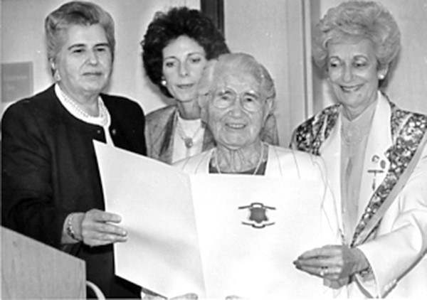 Gerry  Foster, left, Beth Weiss, Chaya Segal and Barbara Long at  the presentation of an award to Gerry Foster and Chaya Segal in 1989.
